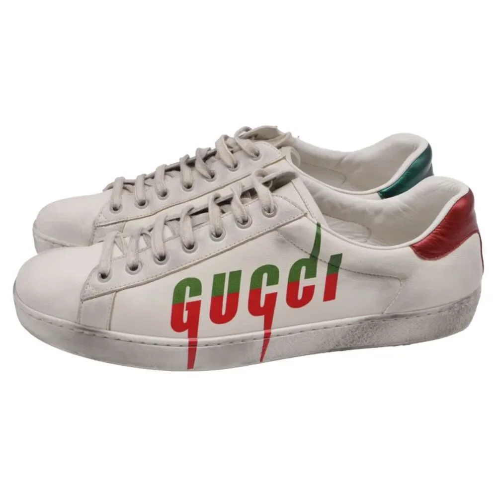 Gucci Ace Blade Distressed Sneakers in White Leather